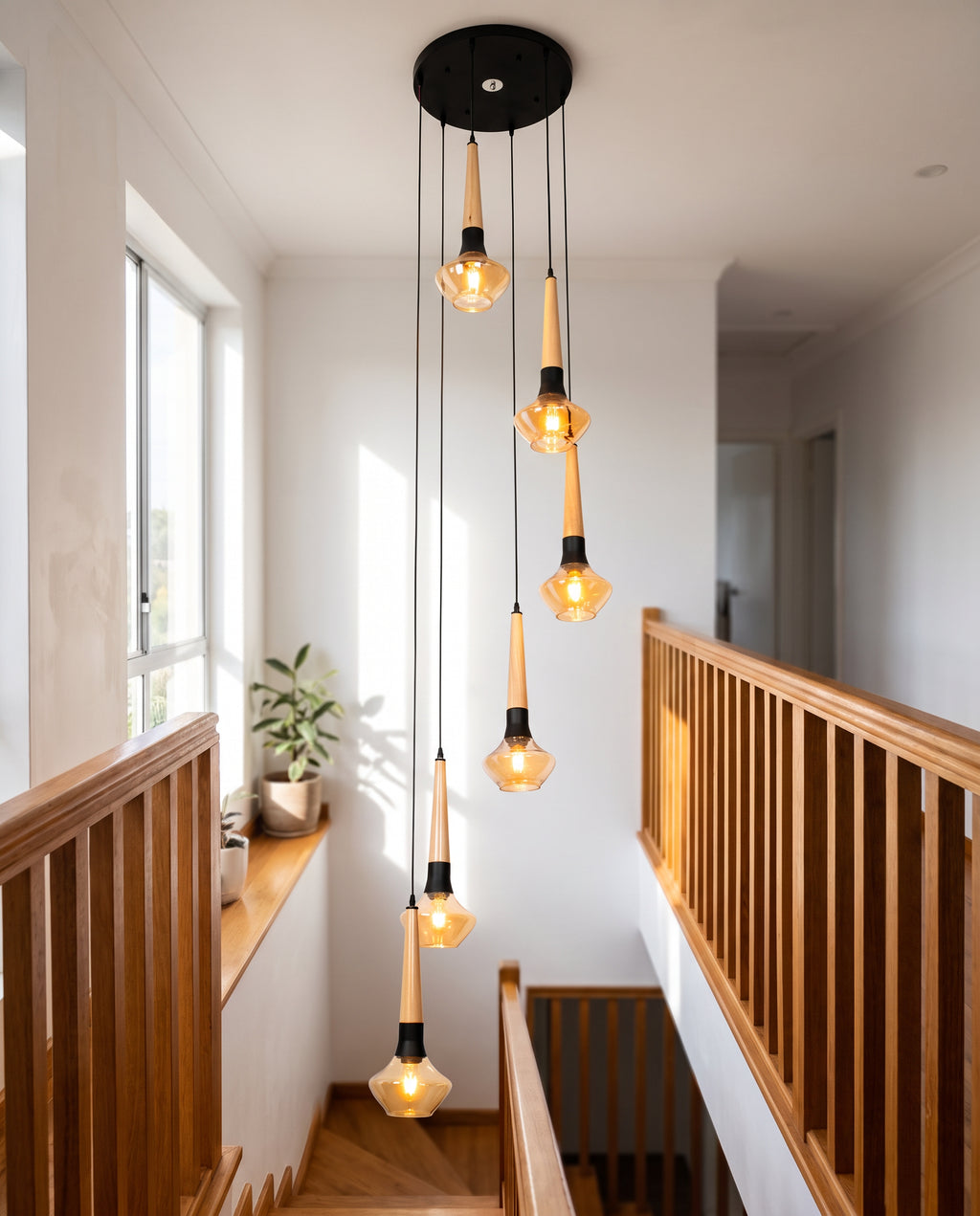 Wood & Amber 8-Drop Spiral Pendant - Light Wood & Amber Glass in a room setting