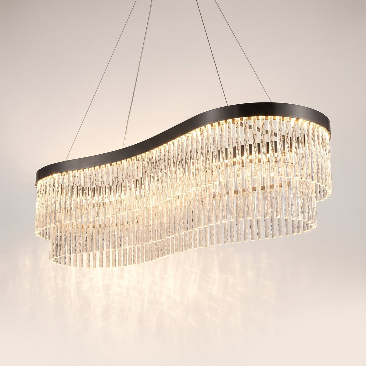 Cascade crystal fringe chandelier with graduated faceted rods