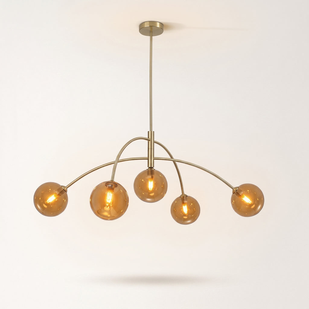 Ember five-arm brass sputnik chandelier with amber glass globes