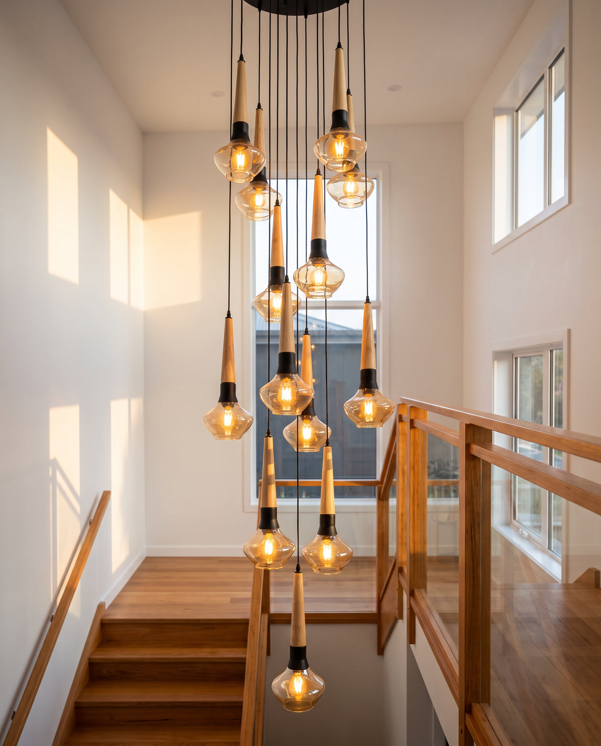Wood & Amber 13-Drop Spiral Pendant - Light Wood & Amber Glass in a room setting